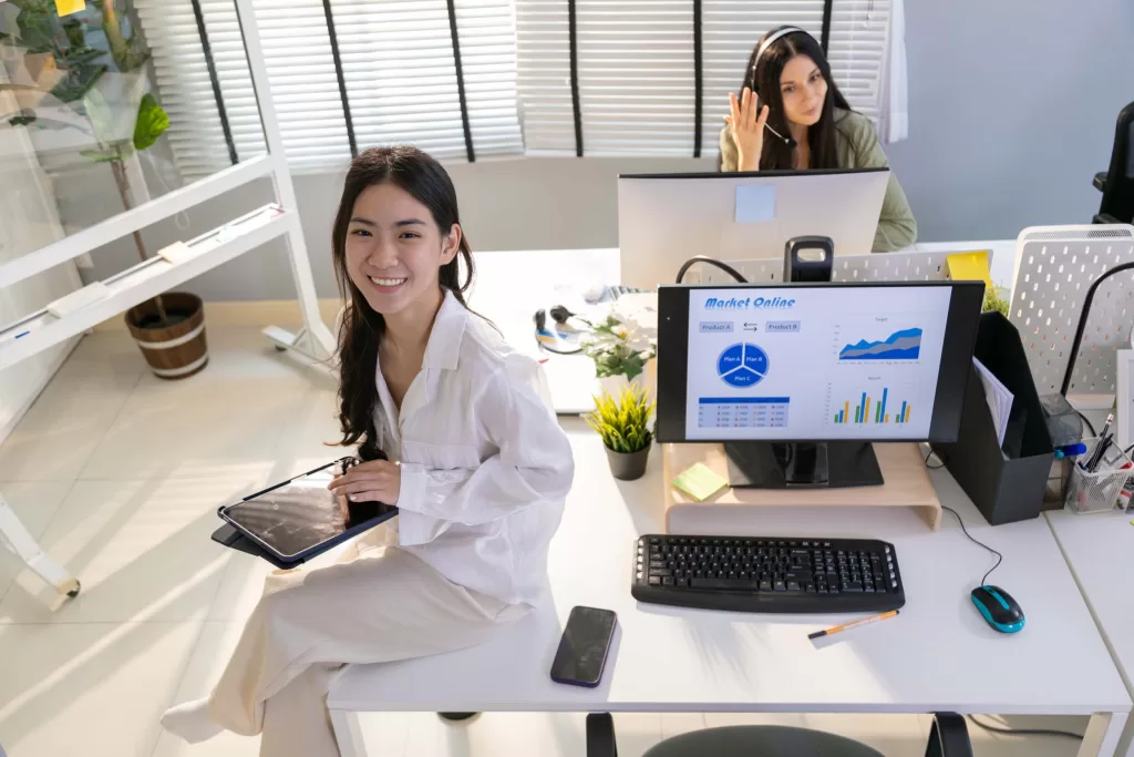 Portrait of young business friends gathered in a modern office conference room and worked as a team